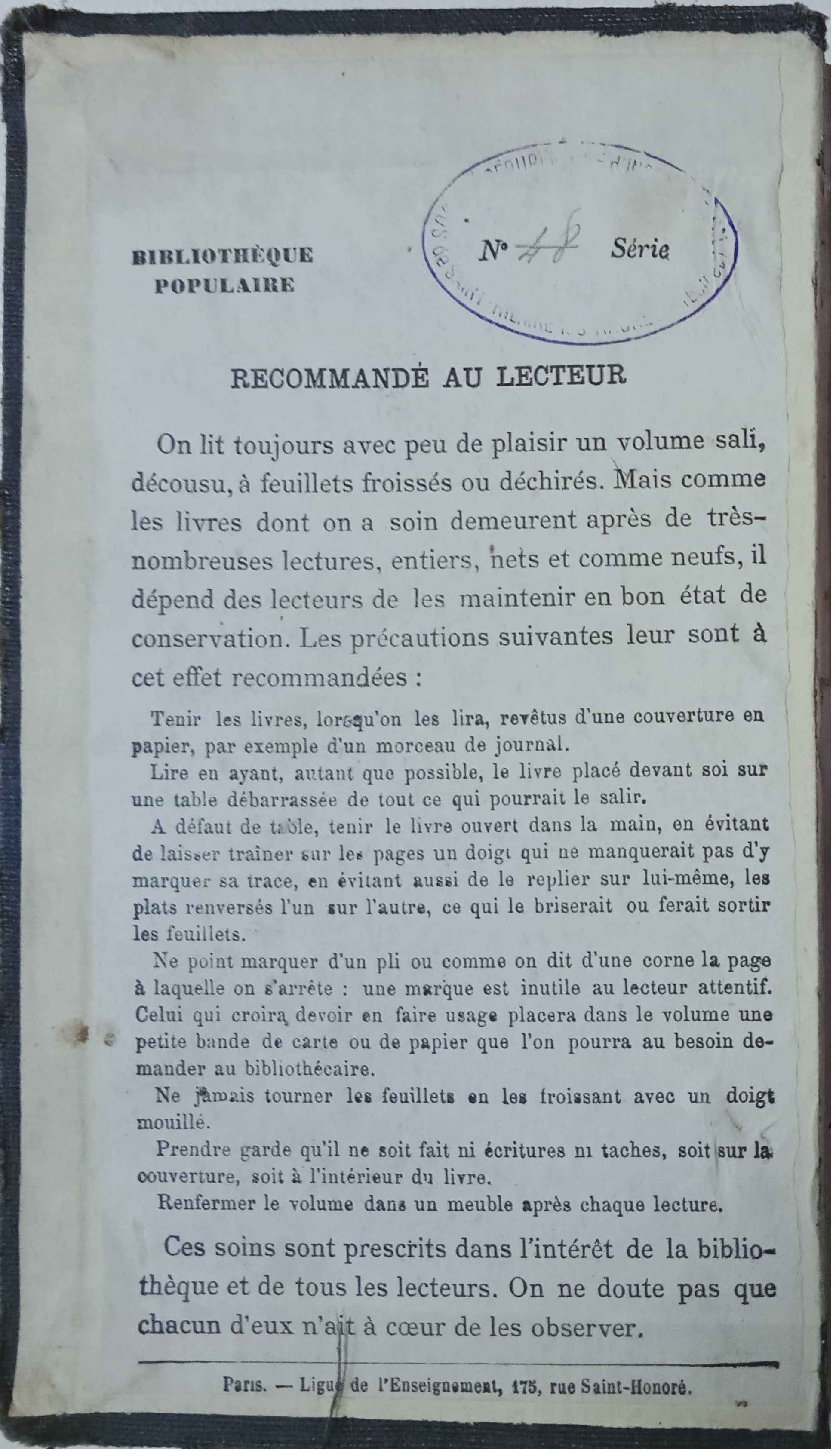 Règlement « Recommandé au lecteur » édité par la Ligue de l'enseignement et collé sur le contreplat supérieur